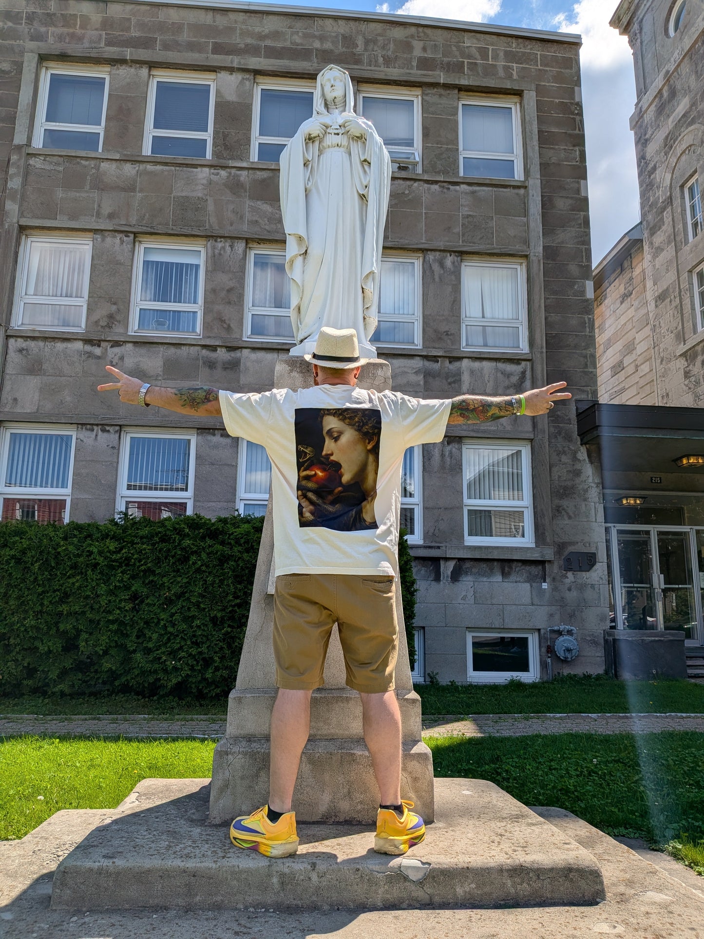 Sacred Devotion Tee — back view showing Renaissance devotional art print