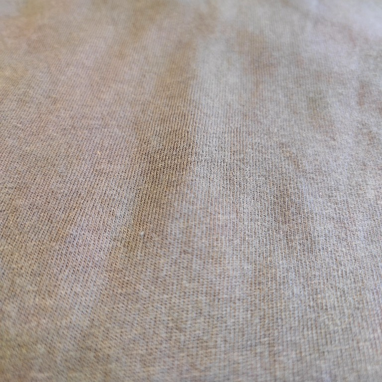 Macro close-up showing the dense, high-rigidity weave of State of Resonance 450GSM loopback cotton fleece