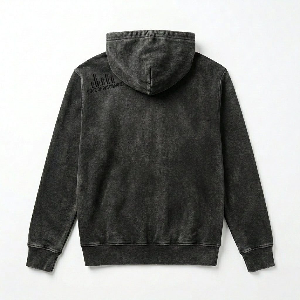 Detailed view of high-density alchemical sigil embroidery on Vintage Black hoodie shoulder